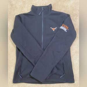 This is a thick black Texas Longhorns jacket with pockets.